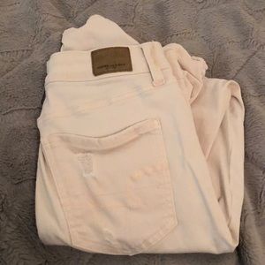 American Eagle light pink/cream ripped jeans